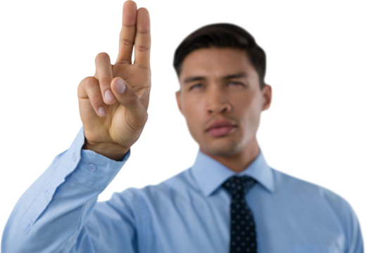 Young businessman touching invisible screen