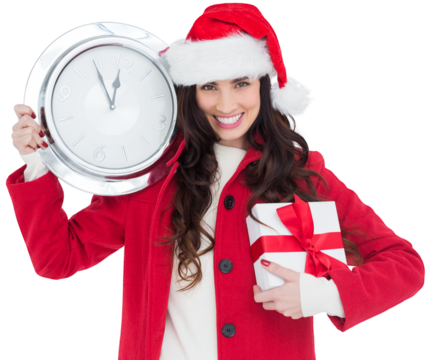 Festive brunette holding a clock and gift