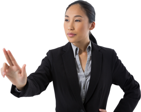 Businesswoman pressing an invisible virtual screen
