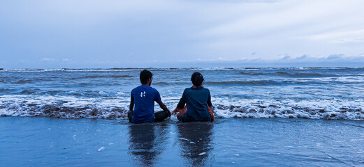 Sitting on the Sand Near the Beach
Cox's Bazar, Bangladesh