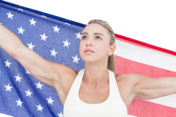 Female athlete holding American flag