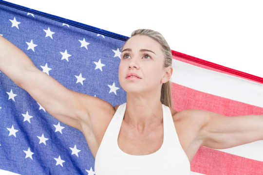 Female athlete holding American flag