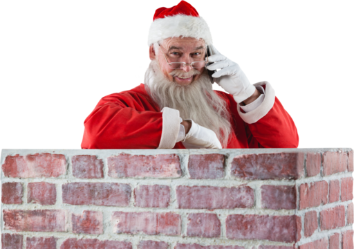 Santa Claus standing beside chimney and talking on mobile phone - Powered by Adobe