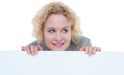 Smiling woman holding blank sign