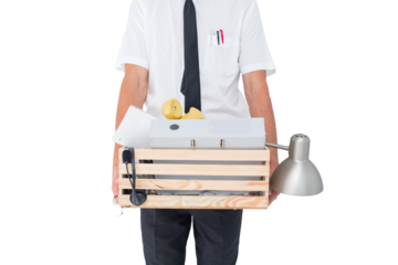 Fired businessman holding box of belongings 