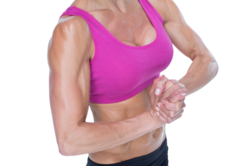 Female bodybuilder flexing mid section