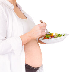 Midsection of pregnant woman having salad
