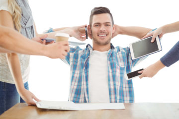 Portrait of smiling man with hands behind head 