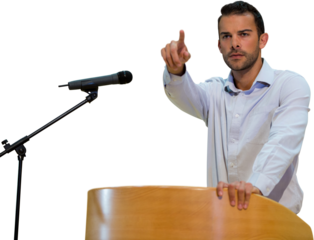 Young businessman pointing at podium