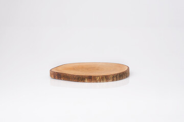 single natural wooden coaster isolated on white background. handmade. wooden display.