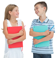 Smiling brother and sister holding their exercise books