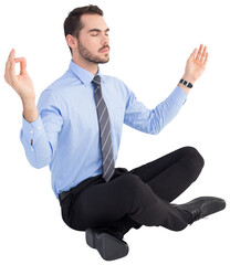 Relaxed businessman sitting in lotus pose