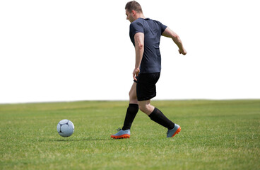Obraz premium Male soccer player playing football