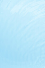 Waves on the surface of the water. gentle light waves, water, top view. Cyan, blue, transparent