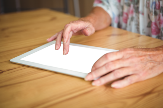 Senior woman with digital tablet
