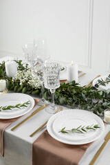 Stylish elegant table setting for festive dinner indoors