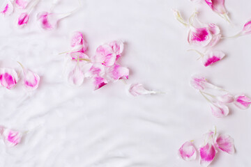Obraz premium Rose petals in water. Waves, water, petals. floral, water Dripping, pouring.