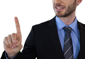 Mid section of smiling businessman touching invisible screen