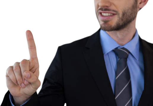 Mid section of smiling businessman touching invisible screen