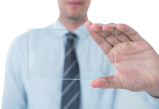 Midsection of businessman holding futuristic mobile phone