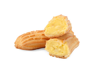 Cut and whole fresh delicious eclairs isolated on white