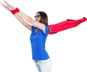 Woman in superhero costume pretending to fly 