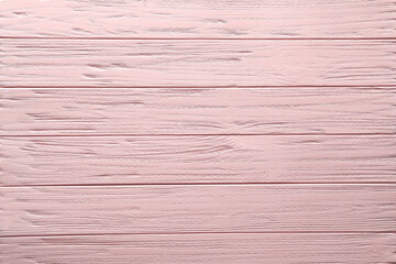 Texture of pink wooden surface as background, top view