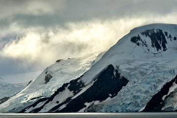 Fototapeta premium Icy Mountain Peaks and Glaciers of King George Island in Antarctica