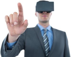 Businessman pointing his finger while using virtual reality headset