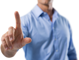 Male executive pressing an invisible virtual screen