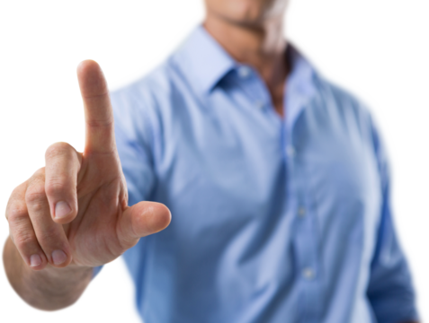 Male executive pressing an invisible virtual screen