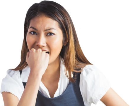Businesswoman biting her fist