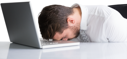 Exhausted businessman sleeping head on laptop