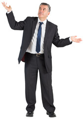 Mature businessman holding his hands out