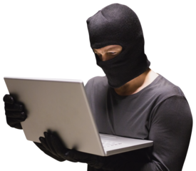Hacker using laptop to steal identity