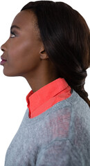 Side view of thoughtful young woman looking up