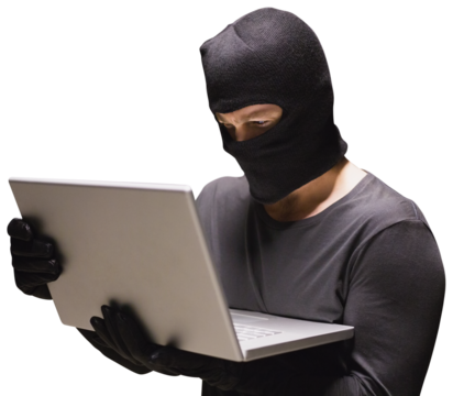 Hacker using laptop to steal identity