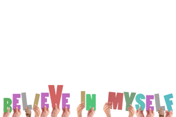 Cropped hands holding colorful words believe in myself 