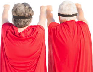 Rear view of senior man and woman pretending as flying