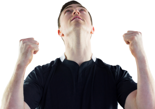 Excited rugby player gesturing victory