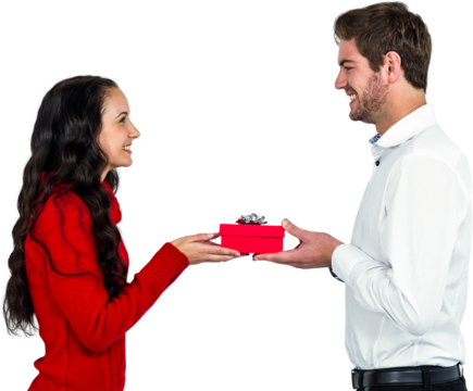 Excited young couple holding gift box