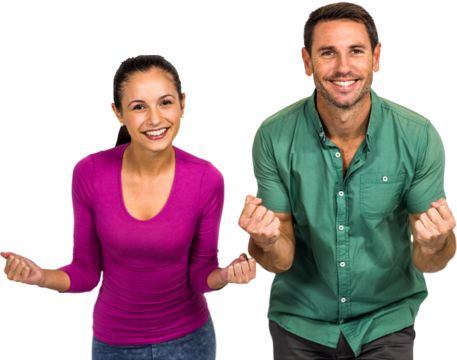 Triumphant couple raising fists