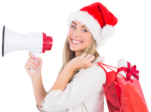 Festive blonde holding megaphone and bags