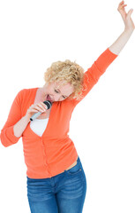 Happy woman dancing while singing in microphone