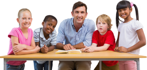 Teacher and pupils smiling at camera at library 