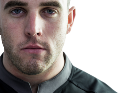 Tough rugby player looking at camera