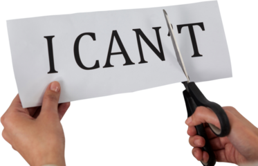 Conceptual image of businesswoman cutting paper that reads we cant