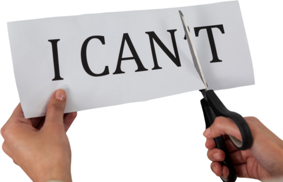 Conceptual image of businesswoman cutting paper that reads we cant