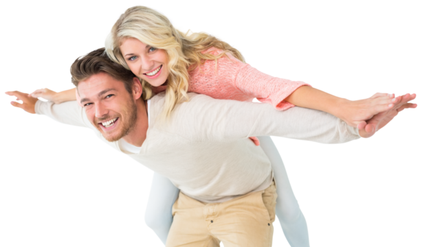 Handsome man giving piggy back to his girlfriend