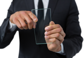 Mid section of businessman touching transparent interface screen